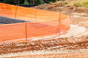 Bright orange safety barrier at a work site in Wesley Chapel